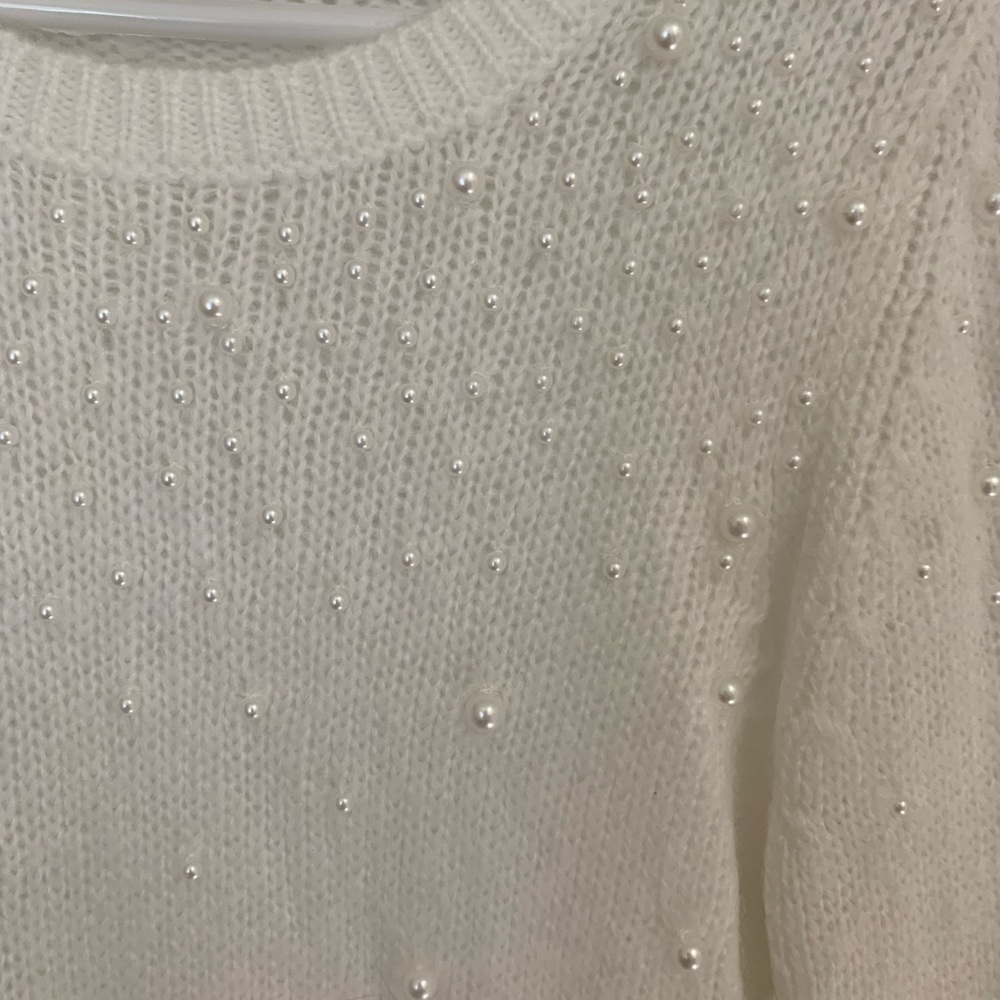 Sweater with pearl embellishments